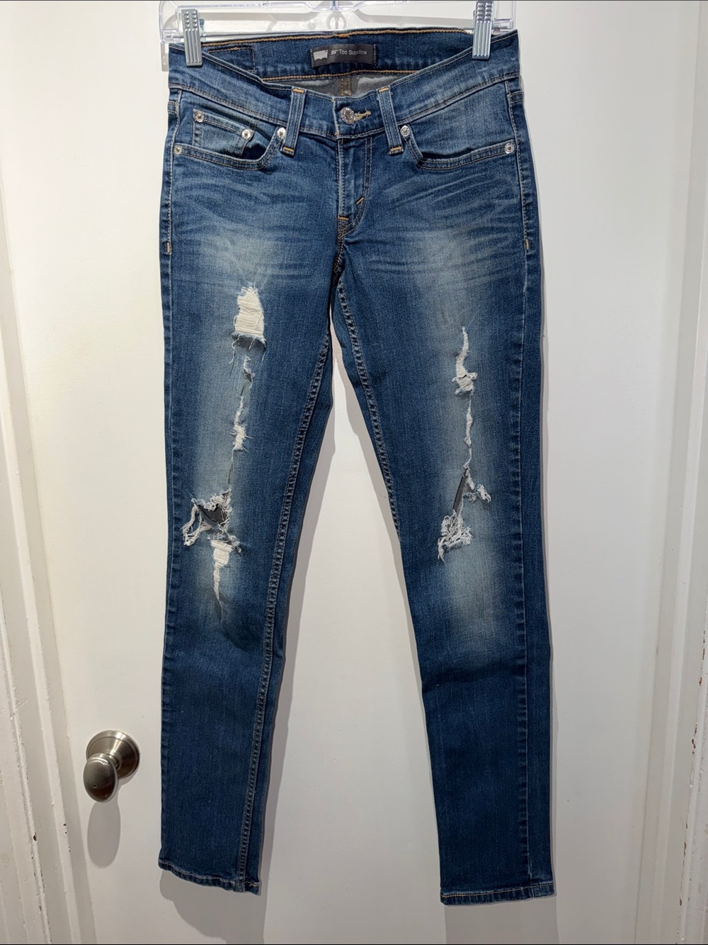 Levi's 524 Distressed Skinny Jeans